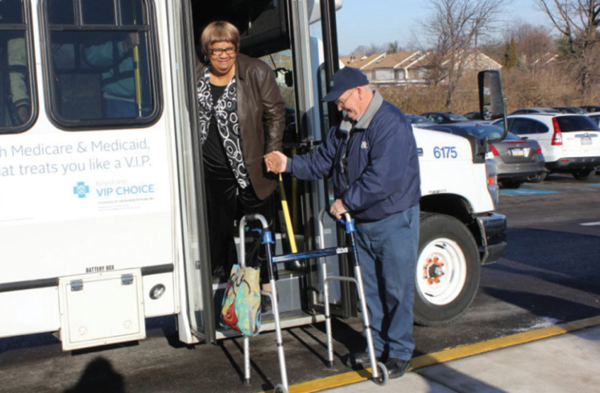 Person getting out of mobility van